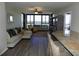 Open living space with water views and a granite countertop at 7100 Sunshine Skyway S Ln # 706, St Petersburg, FL 33711