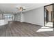 Bright living room with hardwood floors and water views at 7100 Sunshine Skyway S Ln # 706, St Petersburg, FL 33711