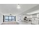 Spacious living room with water views and hardwood floors at 7100 Sunshine Skyway S Ln # 706, St Petersburg, FL 33711