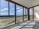Living room with expansive windows and water views at 7100 Sunshine Skyway S Ln # 706, St Petersburg, FL 33711