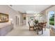 Spacious dining area with a view of the kitchen and living room at 7153 Drewrys Blf, Bradenton, FL 34203