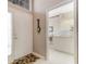 Bright entryway with view into kitchen and a barometer at 7153 Drewrys Blf, Bradenton, FL 34203