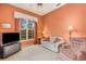 Bright Gathering room with large window and comfortable seating at 7153 Drewrys Blf, Bradenton, FL 34203