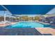 Relaxing community pool with shade umbrellas at 7153 Drewrys Blf, Bradenton, FL 34203