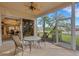 Enjoy this screened patio with view of backyard and neighborhood at 7153 Drewrys Blf, Bradenton, FL 34203