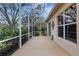 Relaxing screened patio with lush landscaping views at 7153 Drewrys Blf, Bradenton, FL 34203