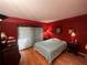 Spacious bedroom with light teal bedding and wood flooring at 7312 Cloister Dr # 7312, Sarasota, FL 34231