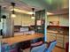 Bright kitchen features stainless steel appliances and a breakfast bar at 7312 Cloister Dr # 7312, Sarasota, FL 34231