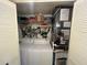 Convenient laundry closet with washer, dryer, and shelving at 7312 Cloister Dr # 7312, Sarasota, FL 34231