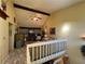 Spacious loft area with a cozy sitting area and built-in desk at 7312 Cloister Dr # 7312, Sarasota, FL 34231