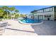Community pool with plenty of lounge chairs at 7312 Cloister Dr # 7312, Sarasota, FL 34231