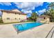 Community pool with ample deck space at 845 Mecca Dr # D, Sarasota, FL 34234