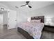 Bedroom with a queen bed, nightstands, and ceiling fan at 11216 Coralbean Dr, Lakewood Ranch, FL 34202