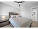 Guest bedroom with a queen-size bed and ensuite bathroom at 11216 Coralbean Dr, Lakewood Ranch, FL 34202