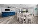 Open concept dining room with modern light fixture at 11216 Coralbean Dr, Lakewood Ranch, FL 34202
