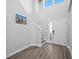 Bright and airy entryway with stairs and high ceilings at 11216 Coralbean Dr, Lakewood Ranch, FL 34202