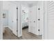 Bright hallway with doors leading to bedrooms at 11216 Coralbean Dr, Lakewood Ranch, FL 34202