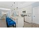 Bright kitchen featuring white cabinetry, stainless steel appliances, and an island with seating at 11216 Coralbean Dr, Lakewood Ranch, FL 34202