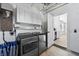 Convenient laundry room with washer, dryer, and cabinets at 11216 Coralbean Dr, Lakewood Ranch, FL 34202
