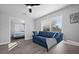 Home office with a couch, desk and view into bedroom at 11216 Coralbean Dr, Lakewood Ranch, FL 34202