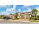 Townhouse exterior with attached garages and landscaping at 13828 Messina Loop # 204, Lakewood Ranch, FL 34211