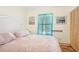 Spacious bedroom with a queen bed and natural light at 16102 Camas Ave, Port Charlotte, FL 33954