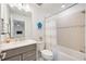 Clean bathroom with a bathtub, shower, and vanity at 16304 Hidden Oak Loop, Bradenton, FL 34211