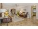 Spacious living room with brown leather couches and tile floors at 1905 Jasmine Dr, Sarasota, FL 34239