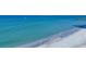 Stunning beach view featuring white sand and aqua water at 2110 Benjamin Franklin Dr # 108, Sarasota, FL 34236