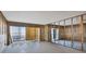 Interior under construction, showing an open space with ocean views and tile flooring at 2110 Benjamin Franklin Dr # 108, Sarasota, FL 34236