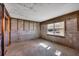 Interior under construction, showing an open space with a window at 2110 Benjamin Franklin Dr # 108, Sarasota, FL 34236