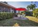 Private backyard with patio and lush landscaping at 2304 89Th Nw St, Bradenton, FL 34209