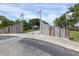 Entrance to the Robinson Preserve with wooden fences and historical flags at 2304 89Th Nw St, Bradenton, FL 34209