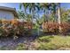 Private side yard with gate access and mature shrubs at 2304 89Th Nw St, Bradenton, FL 34209