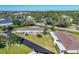 Aerial view of property showcasing the community and landscaping at 2431 Golf Course Dr # 703, Sarasota, FL 34234