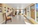 Bright sunroom with many windows, allowing natural light at 2431 Golf Course Dr # 703, Sarasota, FL 34234