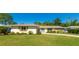 Charming single story home with freshly painted exterior and landscaping at 3353 Kenmore Dr, Sarasota, FL 34231