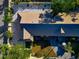 An aerial view showcasing the house's roofline and surrounding landscape at 3607 57Th Avenue W Dr, Bradenton, FL 34210