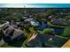 Aerial view of community pool and homes at 3607 57Th Avenue W Dr, Bradenton, FL 34210