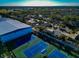 Aerial view of tennis courts and nearby residential neighborhood at 3607 57Th Avenue W Dr, Bradenton, FL 34210