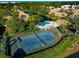 Aerial view of community tennis courts and pool at 3607 57Th Avenue W Dr, Bradenton, FL 34210