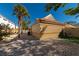 Backyard view, showcasing gravel ground cover and palm trees at 3607 57Th Avenue W Dr, Bradenton, FL 34210
