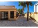 Backyard view with gravel and palm trees at 3607 57Th Avenue W Dr, Bradenton, FL 34210