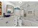 Modern bathroom with marble finishes and walk-in shower at 3607 57Th Avenue W Dr, Bradenton, FL 34210