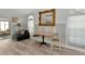 Small dining area with drop leaf table and chairs, located near the living room at 3607 57Th Avenue W Dr, Bradenton, FL 34210