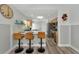 Updated kitchen featuring stainless steel appliances and a breakfast bar at 3607 57Th Avenue W Dr, Bradenton, FL 34210