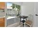 Bright kitchen nook with sliding glass door leading to a patio at 3607 57Th Avenue W Dr, Bradenton, FL 34210
