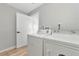 Functional laundry room with washer, dryer, and extra storage at 3607 57Th Avenue W Dr, Bradenton, FL 34210