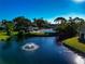 Community pool and pond with fountain at 3607 57Th Avenue W Dr, Bradenton, FL 34210