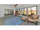 Sunroom featuring comfortable seating and access to patio at 3607 57Th Avenue W Dr, Bradenton, FL 34210